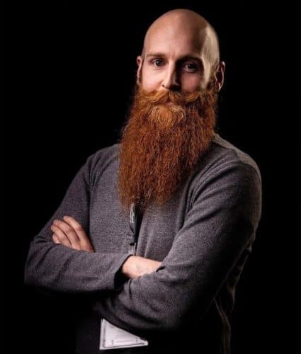 Bald and long ginger beard style