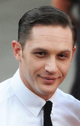 Tom Hardy Comb Over with a clean-shaven face.