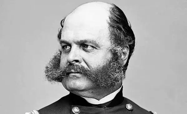 Ambrose Burnside Mutton Chops beard and bald head.