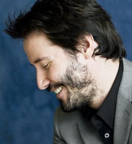 Does Keanu Reeves have alopecia barbae? His patchy beard is as famous as he is.