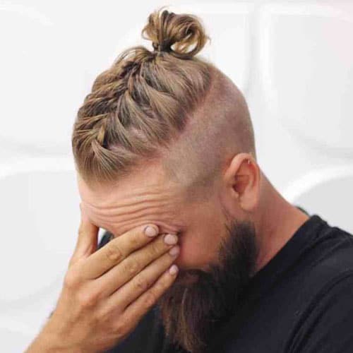 Viking braided mohawk hairstyle.