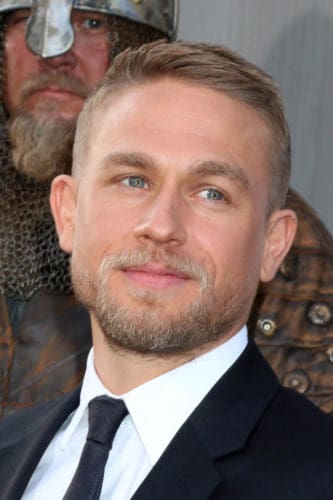 Charlie Hunnam sporting a stylish extended goatee.