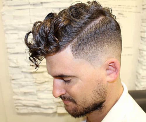 Curls paired with an undercut.