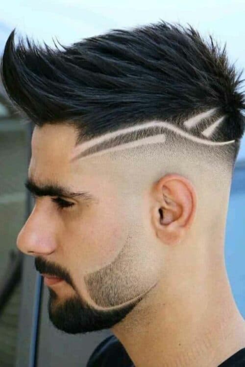fade design haircut with beard