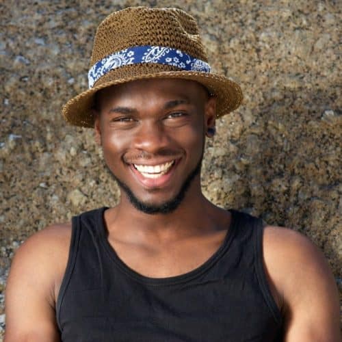 Young African American man with chin strap beard