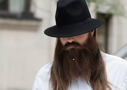 A long beard style with a single beard crystal.