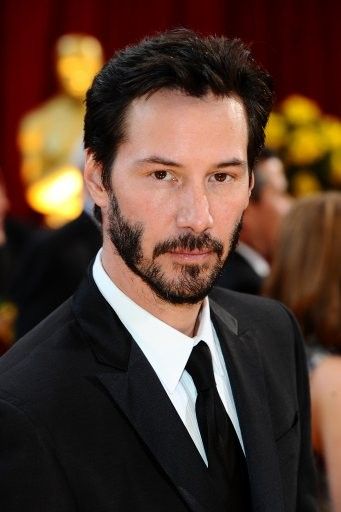 Keanu Reeves sports his famous Patchy Beard style.