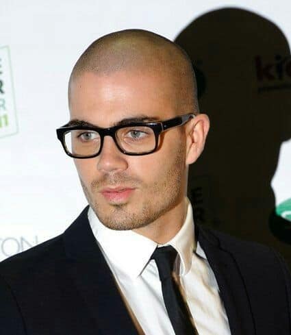 Rectangular Black Frames pair well with a shaved head - Max George