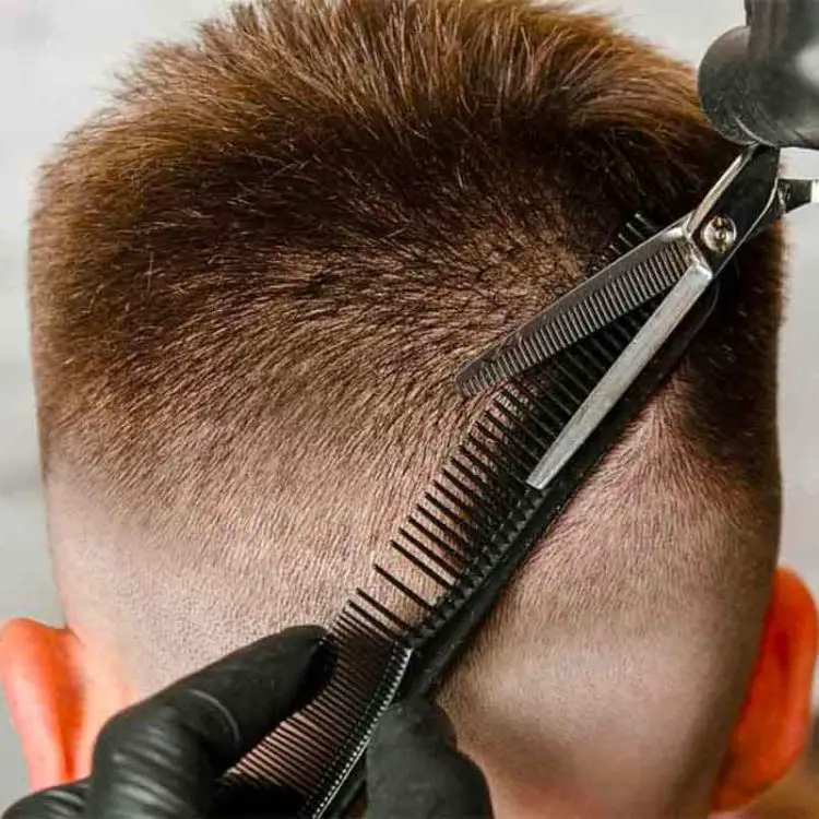 Barber Creating the Best Taper Fade Haircuts