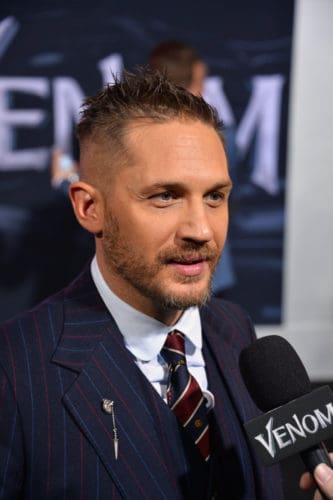 Tom Hardy longer spiked hair at the VENOM premiere.